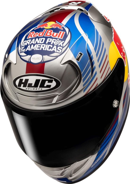 Zilverkleurige integraalhelm met Red Bull Grand Prix of the Americas-logo, Union Jack-ontwerp en HJC-logo.