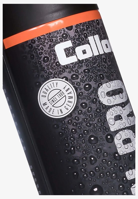 Detail van de Collonil Carbon Pro spuitbus. Zwart met oranje band en druppels. Ronde sticker 'Quality Since 1909 Made in Germany'.