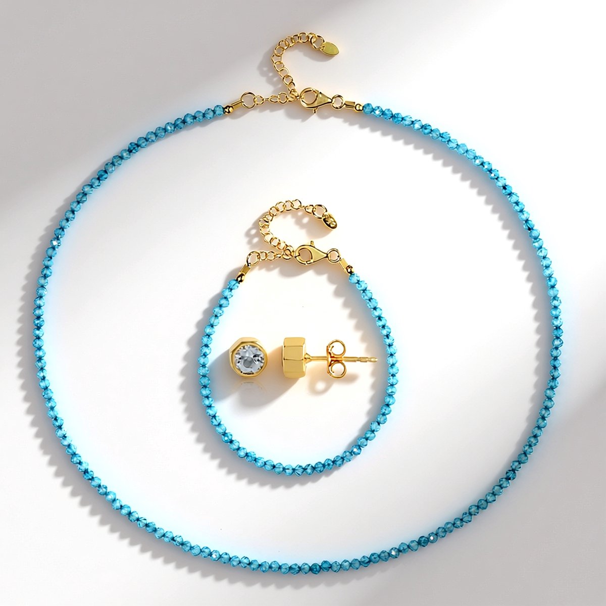 Cavill - Zilveren Set - 925 Sterling Zilver Verguld - Hemel Blauwe Topaas Brazilië 50,9 ct - Ketting Armband Oorbellen - Modern Elegante Sieraden
