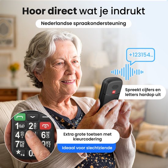 Oudere vrouw met een seniorentelefoon met grote, kleurgecodeerde knoppen. De telefoon spreekt cijfers uit.