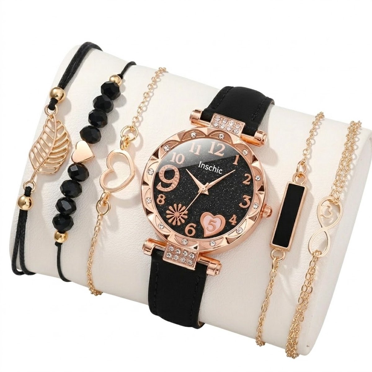 Zwart analoog horloge dames - ronde wijzerplaat met goudkleurige details en hartmotief - zwarte band met goudkleurige accenten - quartz horloge (set zonder box)