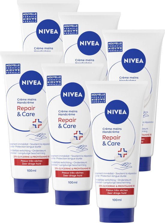 Zes witte NIVEA handcrème tubes met blauwe dop, met "Repair & Care" en "Zeer droge huid".