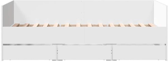Witte slaapbank met open lades en houten lattenbodem.