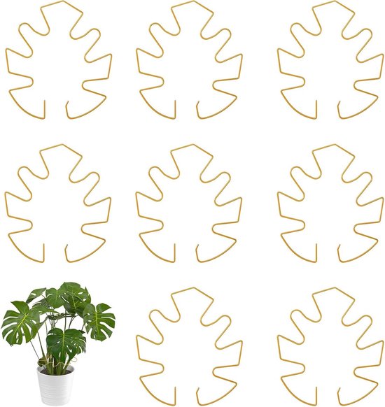 Negen gouden metalen plantensteunen in bladvorm, waarvan één rond een kamerplant in een witte pot.