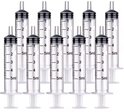 Set van tien doorzichtige 5ml spuiten met zwarte markeringen en plunjers.