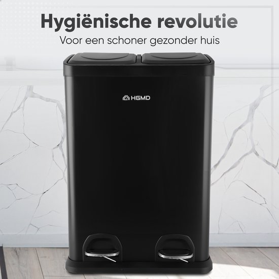Zwarte prullenbak met twee pedalen en twee vakken, voor een schone en hygiënische keuken.