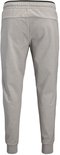 Lichtgrijze joggingbroek met elastische band en zwarte bies aan de taille.