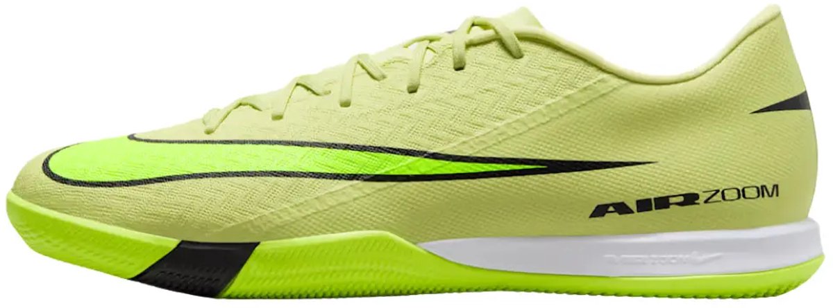 Groene Nike Zoom Vapor 16 Academy IC voetbalschoenen voor heren, ontworpen voor snelheid met verbeterde Air Zoom unit.