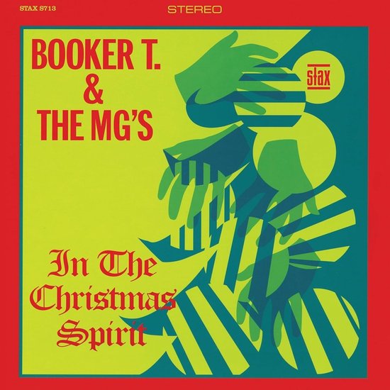Albumhoes voor Booker T. & The MG's "In The Christmas Spirit". Geelgroene achtergrond met rode tekst en groene, gestreepte grafische elementen.