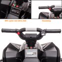 Details van de zwarte kinderquad: stuur met knoppen, MP3-speler met USB & AUX en claxonknop.