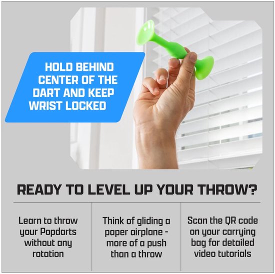 Hand met een groene Popdart, met tekst 'Hold behind center of the dart and keep wrist locked'.