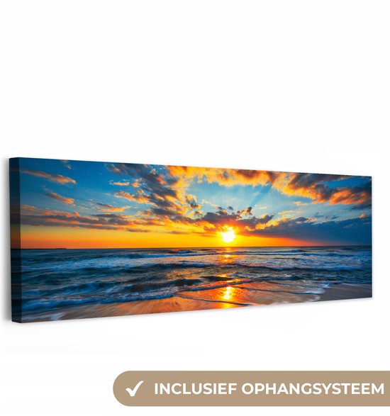 Canvas schilderij 150x50 cm - Wanddecoratie Zee - Zonsondergang - Strand - Wolken - Oranje - Muurdecoratie woonkamer - Slaapkamer decoratie - Kamer accessoires - Schilderijen op canvas