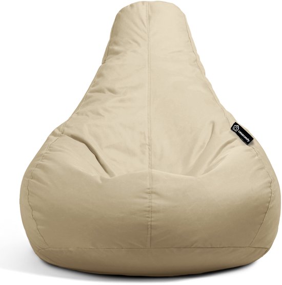 Pouf beige avec étiquette de marque.