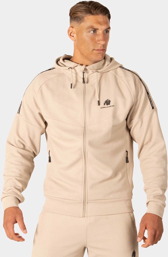 Beige Gorilla Wear trainingsjack met capuchon, ritssluiting en logo op de borst.