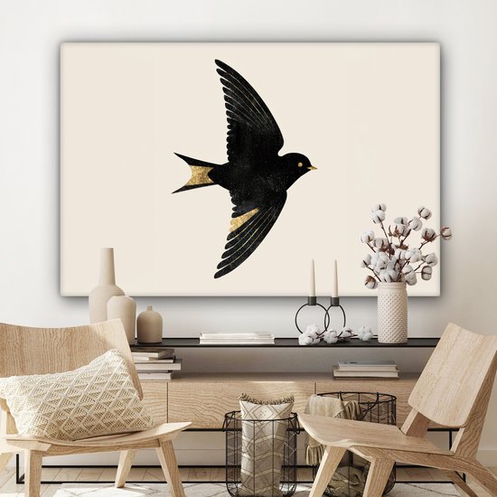 Canvas schilderij 120x80 cm - Wanddecoratie Zwarte zwaluw - Gouden accenten - Lichte achtergrond - Muurdecoratie woonkamer - Slaapkamer decoratie - Kamer accessoires - Schilderijen op canvas