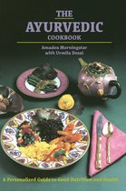 De kaft van "The Ayurvedic Cookbook" toont een theepot en twee borden met vegetarische gerechten.