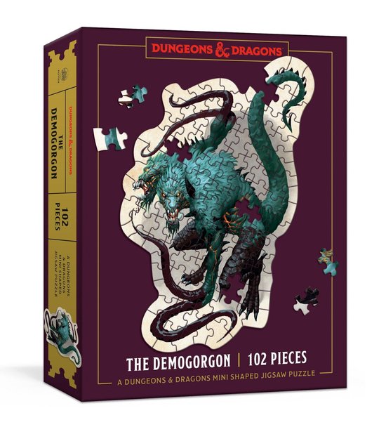 Doos van een 102-delige legpuzzel met de Demogorgon, een groen, veelkoppig monster met tentakels. Dungeons & Dragons logo.