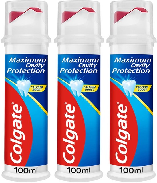 Trois flacons pompe blancs de dentifrice Colgate "Maximum Cavity Protection" de 100 ml, côte à côte.