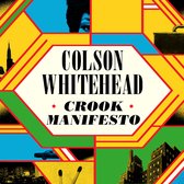 Boekcover met de titel "COLSON WHITEHEAD CROOK MANIFESTO" in het midden, omringd door kleurrijke geometrische patronen en afbeeldingen van New York.