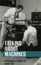 Twee mannen in witte overhemden kijken naar machines. Tekst: TALKING ABOUT MACHINES.