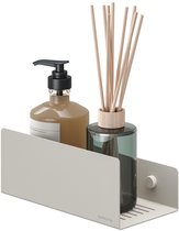 Beige doucheplank van Sealskin met een zeepdispenser en een geurverspreider.