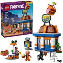 Boîte du Restaurant Durrr Burger LEGO avec set LEGO et tenue bonus en jeu.