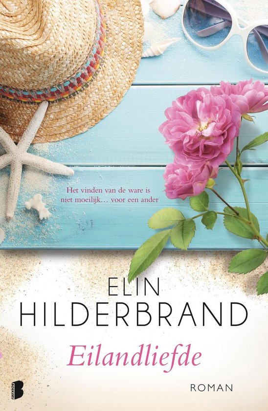 Boekcover van "Eilandliefde" van Elin Hilderbrand. Een strooien hoed met gekleurde band, een zonnebril en een roze bloem liggen op een blauw houten ondergrond met zand.