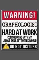 Warning Graphologist Hard At Work