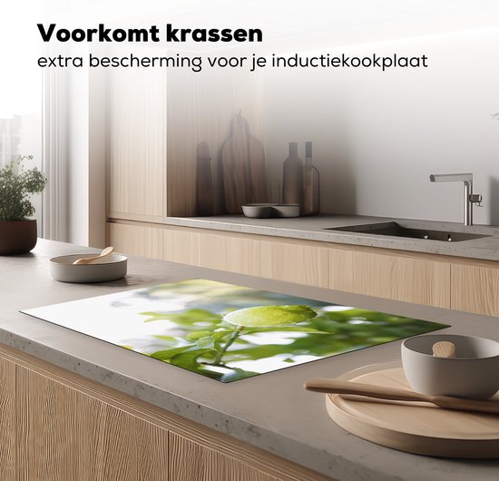 KitchenYeah® Inductie beschermer 80x52 cm - Close up of wet lime on branch - Kookplaataccessoires - Afdekplaat voor kookplaat - Inductiebeschermer - Inductiemat - Inductieplaat mat