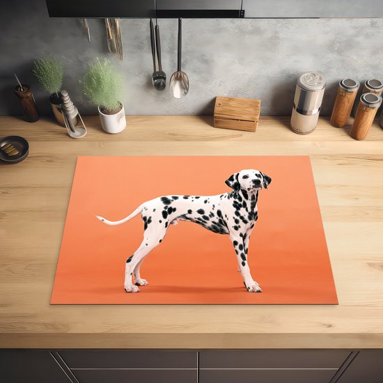 KitchenYeah® Inductie beschermer 70x52 cm - Hond - Dalmatiër - Oranje - Kookplaataccessoires - Afdekplaat voor kookplaat - Inductiebeschermer - Inductiemat - Inductieplaat mat