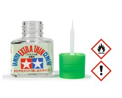 foto van Tamiya Hobbylijm Modelbouw - 87038 Extra Dun Cement with Brush - Potje Lijm - Knutsellijm - Geschikt voor Modelbouwpakket - Volwassenen