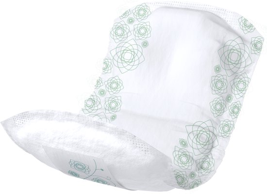 Wit inlegkruisje met herhalend groen geometrisch bloemenpatroon.