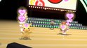 Een Pikachu en een Starly die dansen met hartjes om hen heen op een podium.
