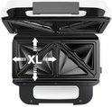 Bovenaanzicht van de open Tefal Snack XL tosti- en wafelmaker met XL-markeringen.