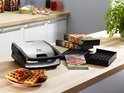 Tefal snackapparaat met wafelplaten en dozen van het snackapparaat.