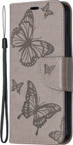 Mobigear Telefoonhoesje geschikt voor Apple iPhone 12 Pro Max Hoesje | Mobigear Butterfly Bookcase Portemonnee | Pasjeshouder voor 2 Pasjes | Telefoonhoesje voor Pinpas / OV Kaart / Rijbewijs - Grijs