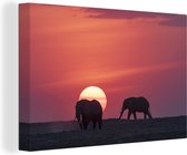 Canvas Schilderij Olifanten bij zonsondergang in het Masai Mara National Park in Kenia - 30x20 cm - Wanddecoratie