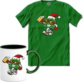 Kerstman zijn beste hulpje - T-Shirt met mok - Heren - Kelly Groen - Maat M