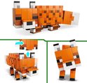 Renard LEGO orange avec des taches brunes, pattes et queue mobiles.