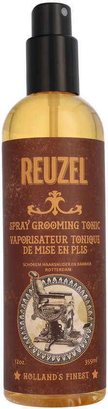 Reuzel Spray Grooming Tonic fles met bruine vloeistof, oranje etiket met goudkleurige tekst en illustratie van een tondeuse.