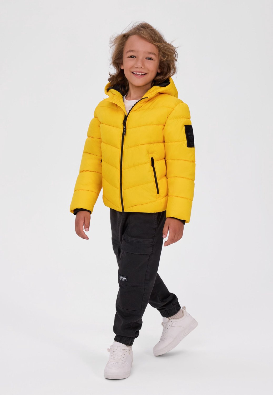 Minoti winterjas jongens – schuine doorstiksels – ritszakken – geel