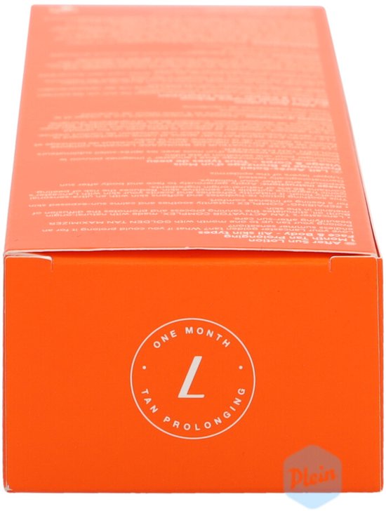 Zij-aanzicht van Lancaster Golden Tan Maximizer doos met cirkelvormig 'ONE MONTH TAN PROLONGING' logo.