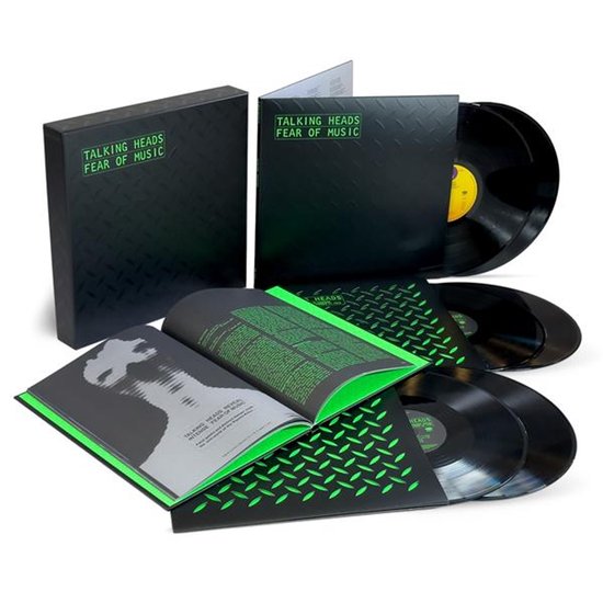 Coffret super deluxe Talking Heads Fear of Music avec vinyles noirs, livre photo et pochette texturée au logo vert.