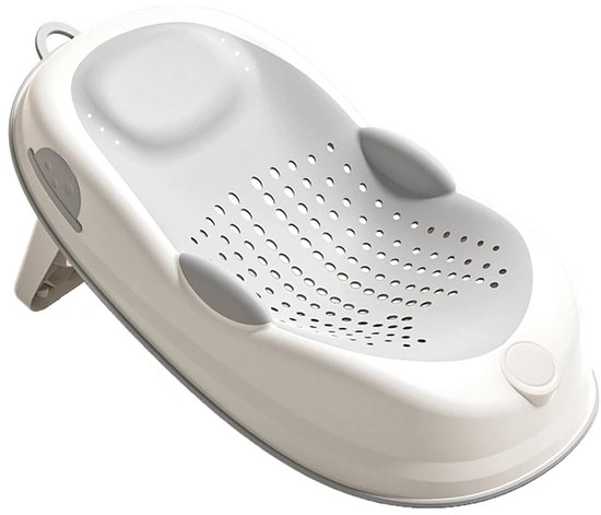 Ergonomisch babybadzitje met geperforeerd grijs zitvlak en crème behuizing.