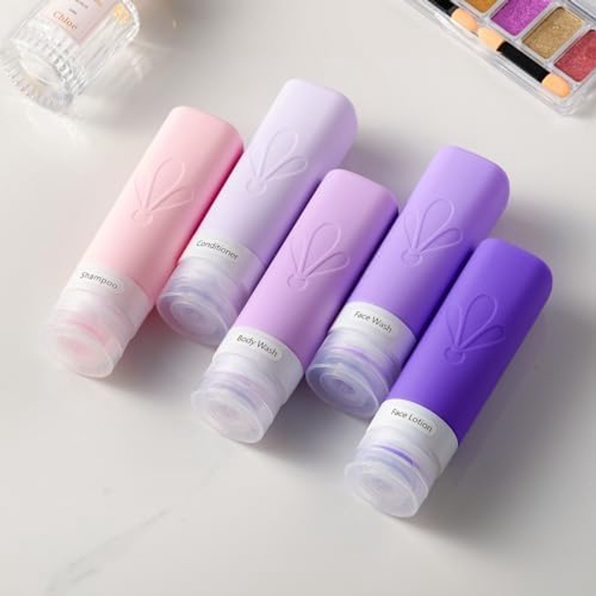 Reisflessen om te vullen, TSA-goedgekeurde 90 ml siliconen reisflessen, BPA-vrije, lekvrije reisformaat container - Holiday Essentials voor vrouwen, reisset vloeistoffen inclusief toilettas