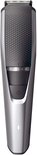 Zilveren Philips baardtrimmer met zwarte grip, zoomwiel en aan/uit-knop.