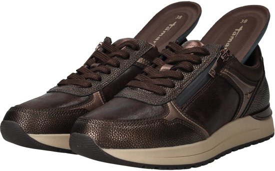 Bruine Tamaris sneakers met rits, verschillende texturen en de binnenzool zichtbaar.