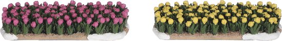 Twee bloembedden met roze en gele tulpen