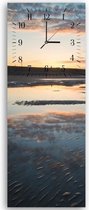 Trend24 - Wandklok - Overstroomd Strand - Muurklok - Landschappen - 30x90x2 cm - Grijs