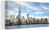 Canvas Schilderij De skyline van Manhattan met het One World Trade Center - 40x20 cm - Wanddecoratie